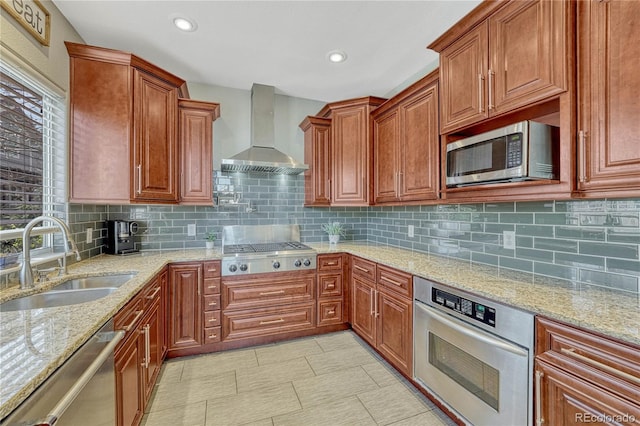 12646 S Dove Creek Way, Parker, CO 80134 - kitchen with wall chimney range hood, appliances with stainless steel finishes, a sink, light stone countertops, and tasteful backsplash