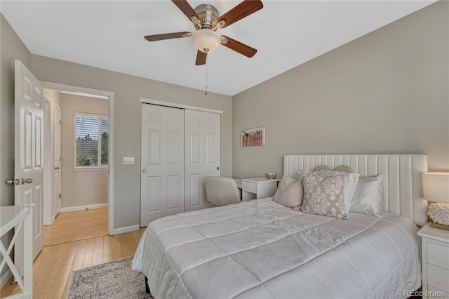 12646 S Dove Creek Way, Parker, CO 80134 - bedroom featuring light wood-style floors, baseboards, a closet, and a ceiling fan