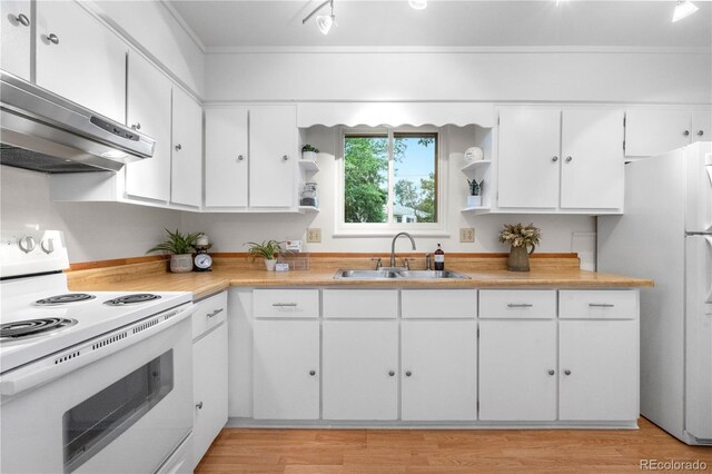 3700 Indianpipe Cir, Colorado Springs, CO 80918 - kitchen featuring white appliances, open shelves, wall chimney exhaust hood, and white cabinets