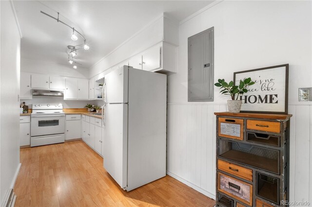 3700 Indianpipe Cir, Colorado Springs, CO 80918 - kitchen with white appliances, electric panel, under cabinet range hood, white cabinets, and wainscoting