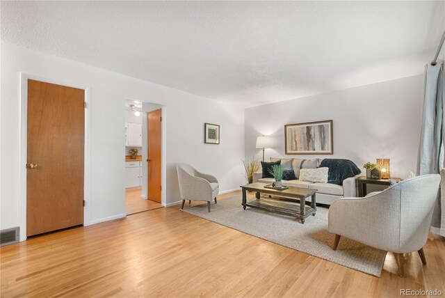 3700 Indianpipe Cir, Colorado Springs, CO 80918 - living room with wood finished floors and baseboards