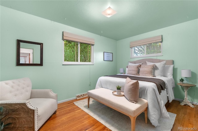3700 Indianpipe Cir, Colorado Springs, CO 80918 - bedroom with baseboards and light wood-style flooring