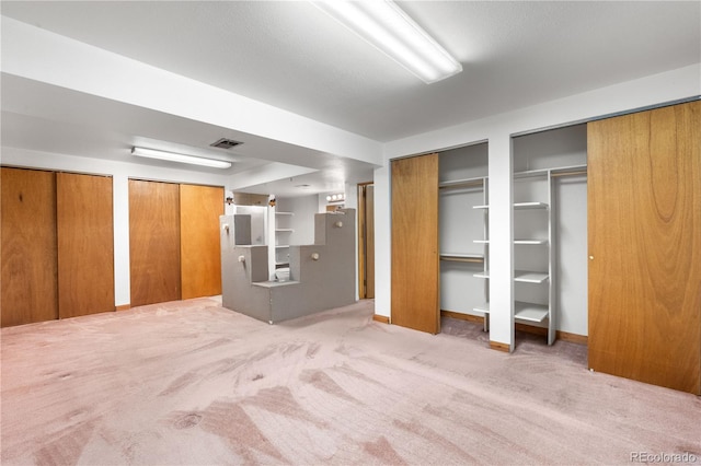 3700 Indianpipe Cir, Colorado Springs, CO 80918 - unfurnished bedroom featuring two closets and carpet
