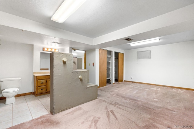 3700 Indianpipe Cir, Colorado Springs, CO 80918 - finished basement with light colored carpet and stairs