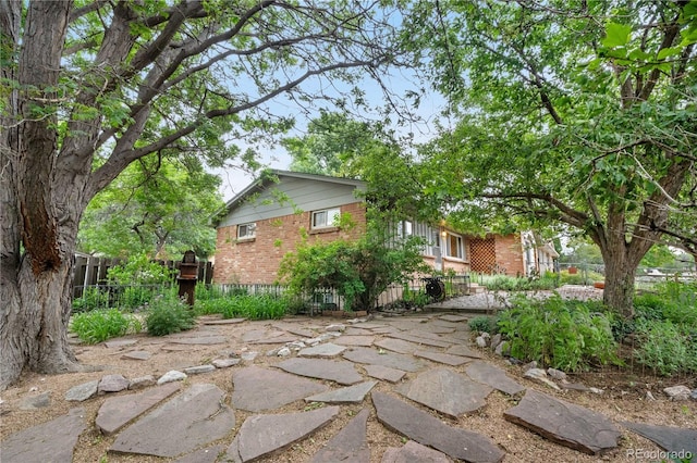 3700 Indianpipe Cir, Colorado Springs, CO 80918 - view of side of property featuring brick siding