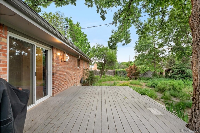 3700 Indianpipe Cir, Colorado Springs, CO 80918 - wooden deck with a fenced backyard