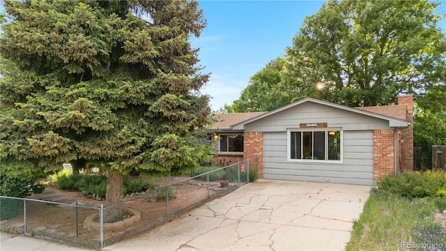 3700 Indianpipe Cir, Colorado Springs, CO 80918 - back of house with brick siding and a chimney