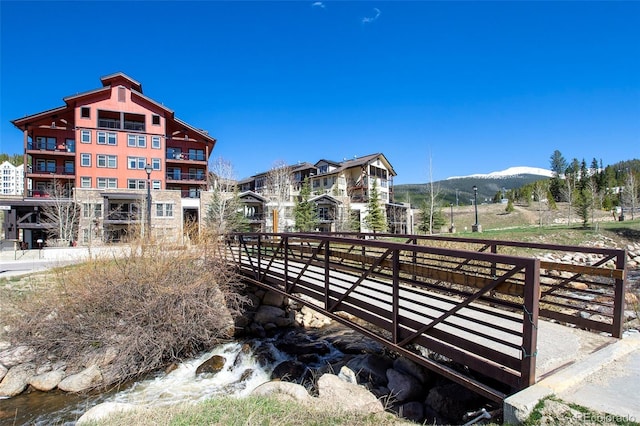 view of community with a water view