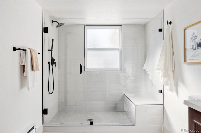 bathroom featuring walk in shower