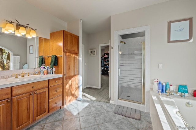332 Battlement Creek Trl, Parachute, CO 81635 - full bathroom with a shower stall, vanity, a bath, and tile patterned floors