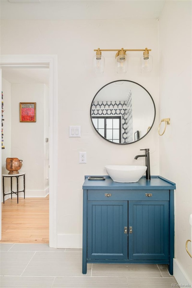1300 N Glencoe St, Denver, CO 80220 - bathroom featuring vanity and baseboards