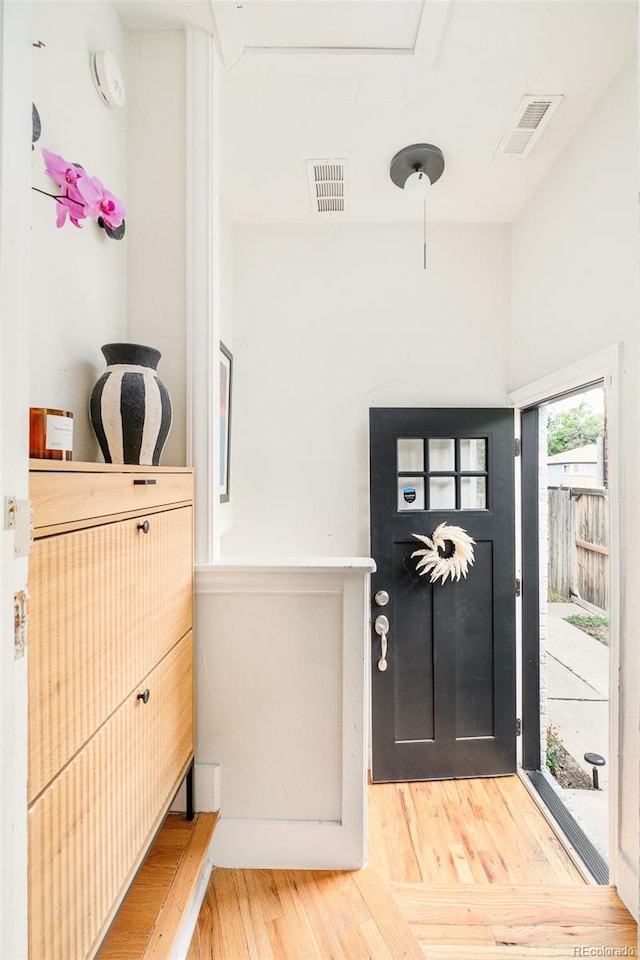 1300 N Glencoe St, Denver, CO 80220 - entryway with light wood-style floors
