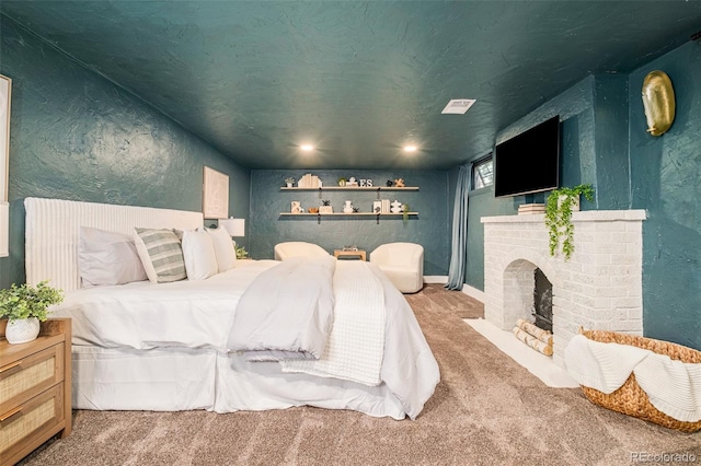 1300 N Glencoe St, Denver, CO 80220 - bedroom featuring carpet flooring, a textured wall, and a fireplace
