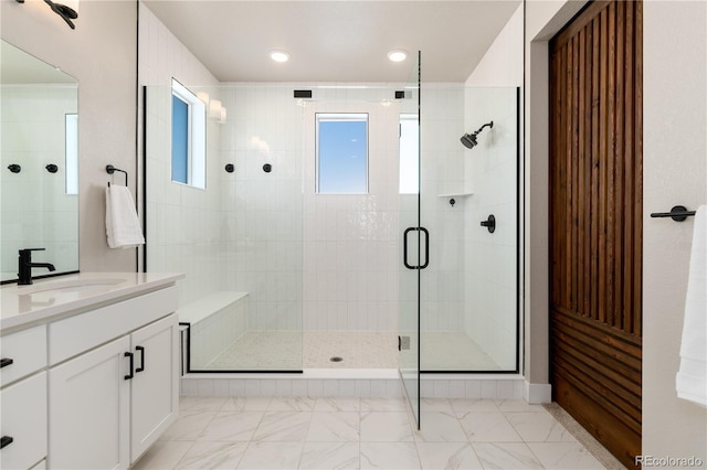 bathroom featuring vanity and walk in shower