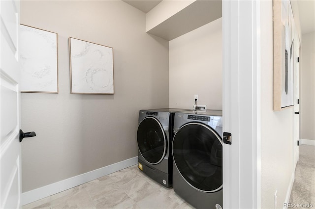 laundry area featuring independent washer and dryer