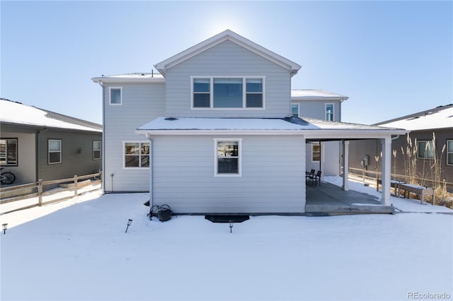 view of snow covered property