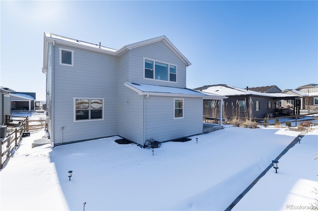 view of snow covered property