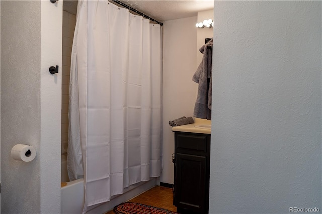 bathroom featuring shower / tub combo with curtain and vanity