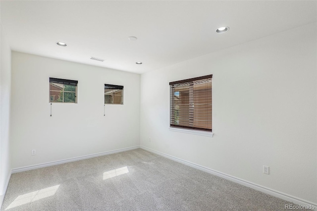 view of carpeted spare room