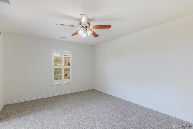 carpeted empty room with ceiling fan