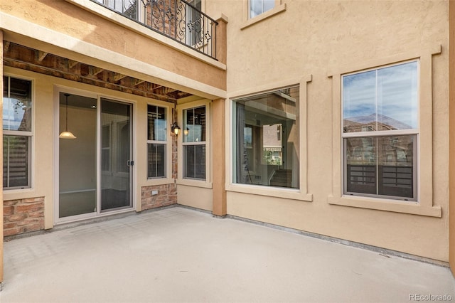 view of patio / terrace featuring a balcony