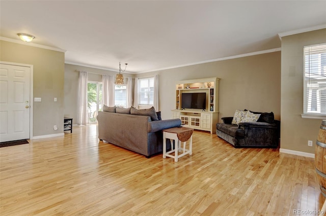 13025 Umatilla Ct, Denver, CO 80234 - living area featuring light wood-style floors and ornamental molding
