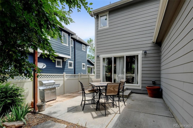 13025 Umatilla Ct, Denver, CO 80234 - view of patio featuring grilling area and outdoor dining area