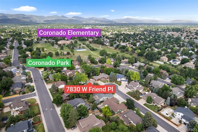 7830 W Friend Pl, Littleton, CO 80128 - aerial perspective of suburban area featuring a mountain backdrop