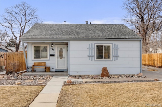 bungalow with a front lawn