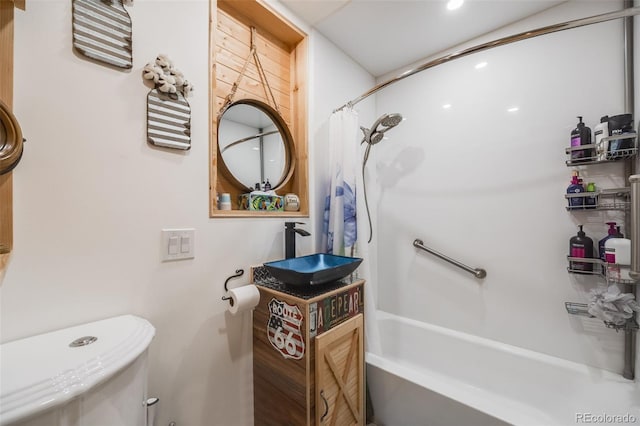 full bathroom with vanity, toilet, and shower / bath combo with shower curtain