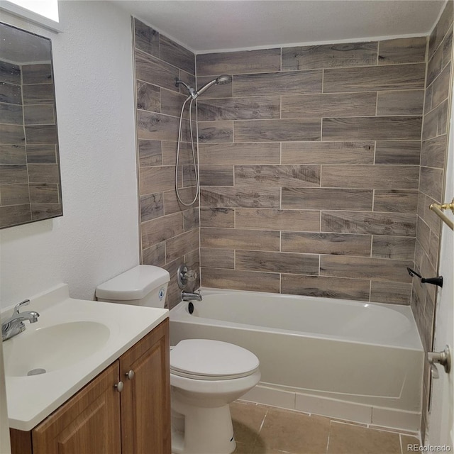 970 S Peoria St, Aurora, CO 80012 - bathroom featuring vanity, shower / bath combination, and tile patterned flooring