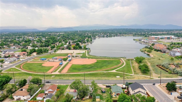 bird's eye view featuring a water and mountain view