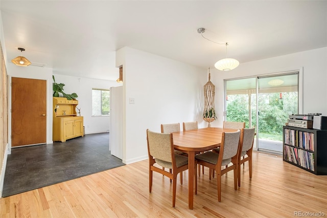 12193 W New Mexico Pl, Lakewood, CO 80228 - dining area featuring wood finished floors and baseboards