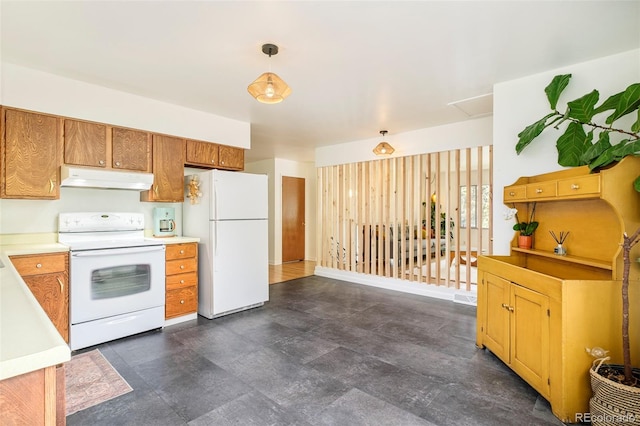 12193 W New Mexico Pl, Lakewood, CO 80228 - kitchen with white appliances, under cabinet range hood, light countertops, and pendant lighting