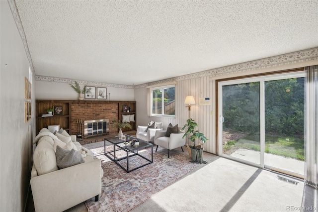4474 S Vrain St, Denver, CO 80236 - carpeted living room with a textured ceiling and a fireplace