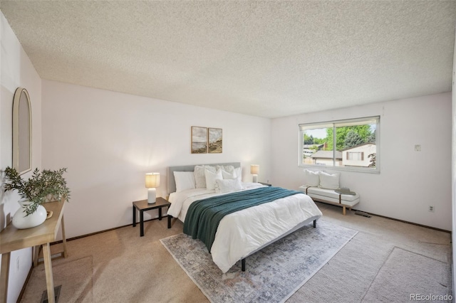 4474 S Vrain St, Denver, CO 80236 - bedroom featuring light colored carpet and a textured ceiling