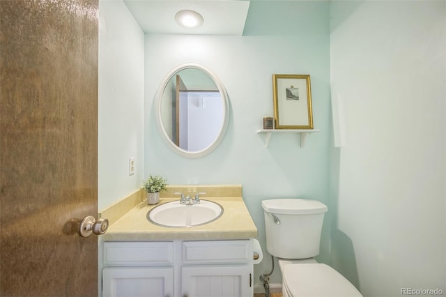 4474 S Vrain St, Denver, CO 80236 - bathroom featuring toilet and vanity