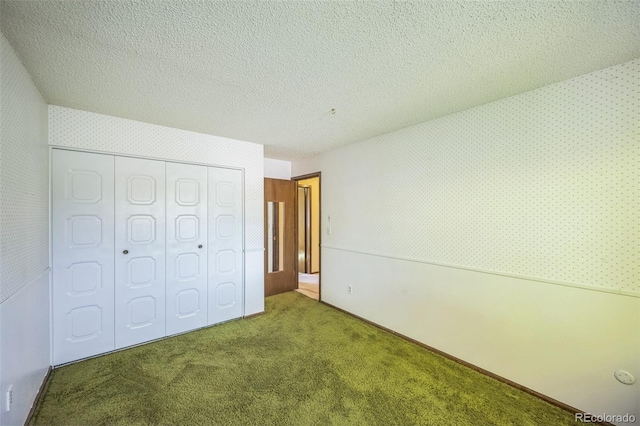 4474 S Vrain St, Denver, CO 80236 - unfurnished bedroom with carpet, a closet, and a textured ceiling