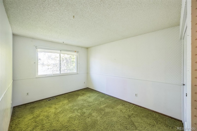4474 S Vrain St, Denver, CO 80236 - carpeted spare room with a textured ceiling