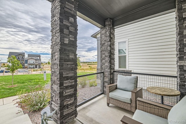 view of patio / terrace featuring a balcony