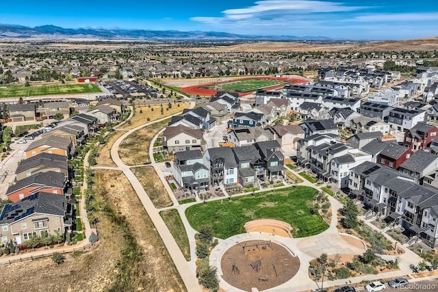 birds eye view of property with a mountain view