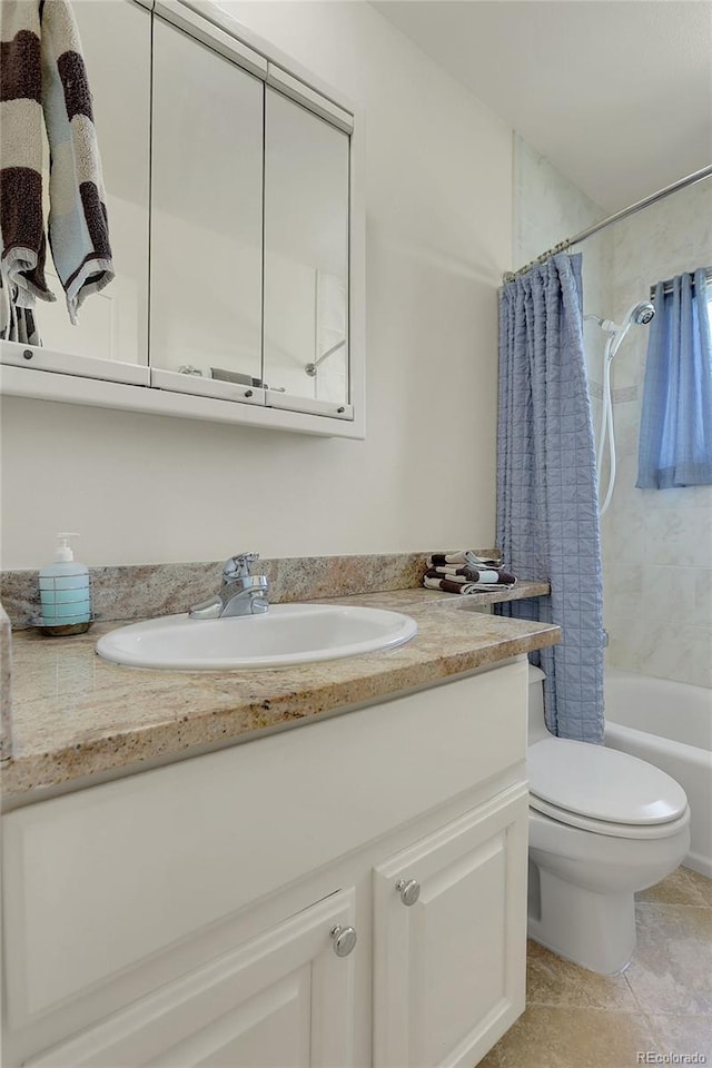 bathroom featuring tile patterned flooring, toilet, vanity, and shower / bath combination with curtain