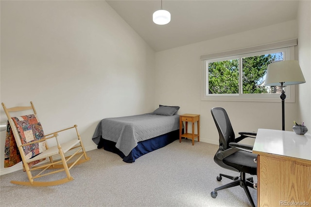 bedroom featuring carpet floors, lofted ceiling, and baseboards