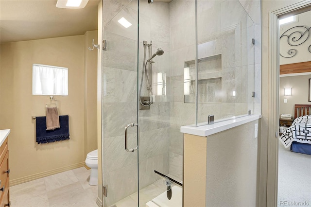ensuite bathroom featuring a shower stall, ensuite bath, toilet, and vanity