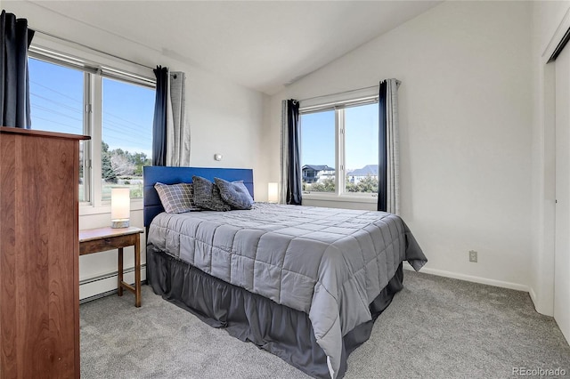 carpeted bedroom with baseboards, lofted ceiling, and baseboard heating