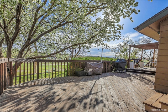 deck featuring grilling area