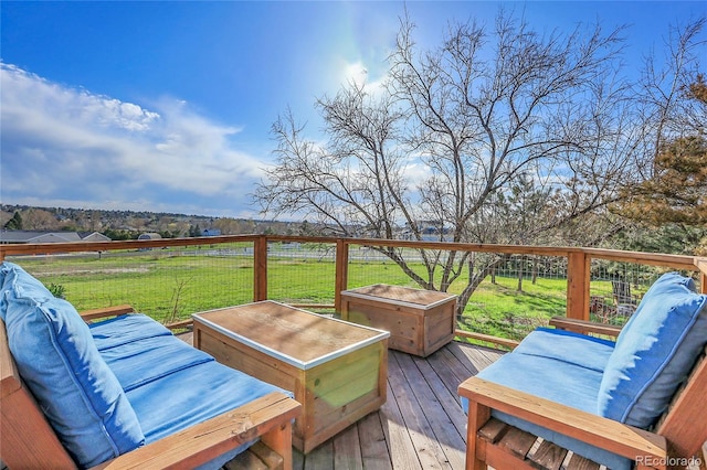 wooden deck with a yard