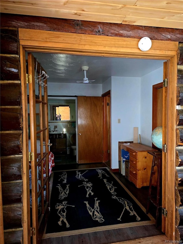 interior space with dark hardwood / wood-style floors