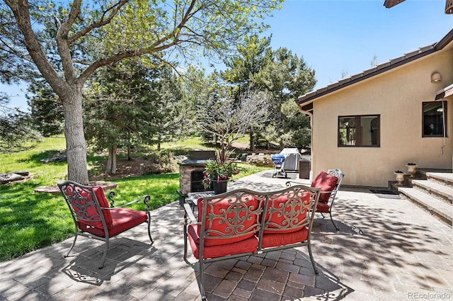5904 Meadowbrook Dr, Morrison, CO 80465 - view of patio with grilling area and an outdoor hangout area