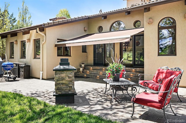 5904 Meadowbrook Dr, Morrison, CO 80465 - back of house with a patio area and stucco siding